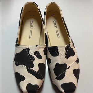 TOMS Black and Cream Patterned Slip-Ons